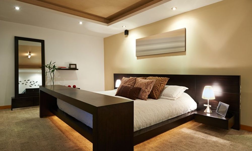 <span class="uk-h4">Image is of a bedroom with smart lighting under the bed and on the ceiling.</span>